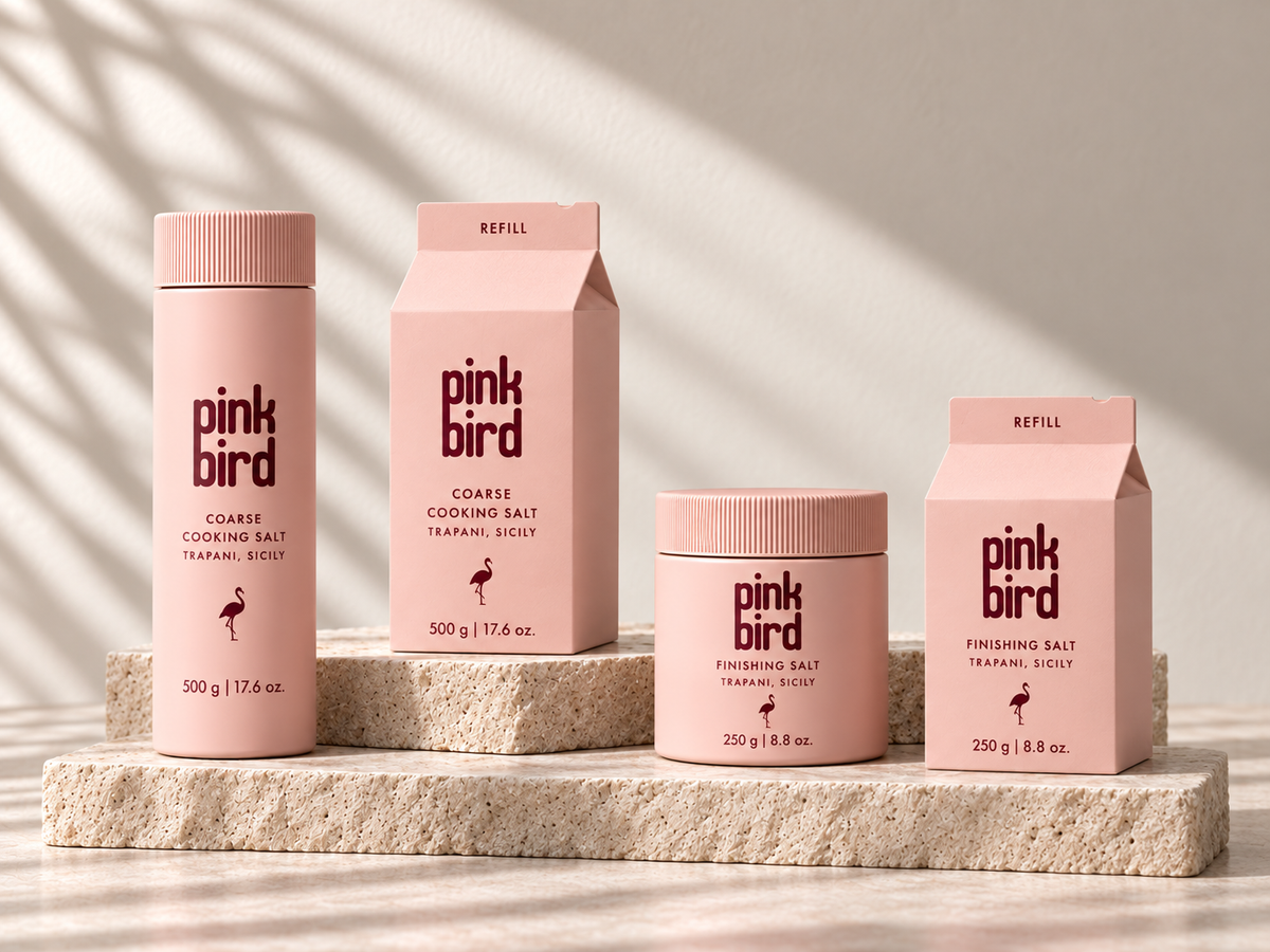 Cooking and finishing salt bottles with their matching refill cartons